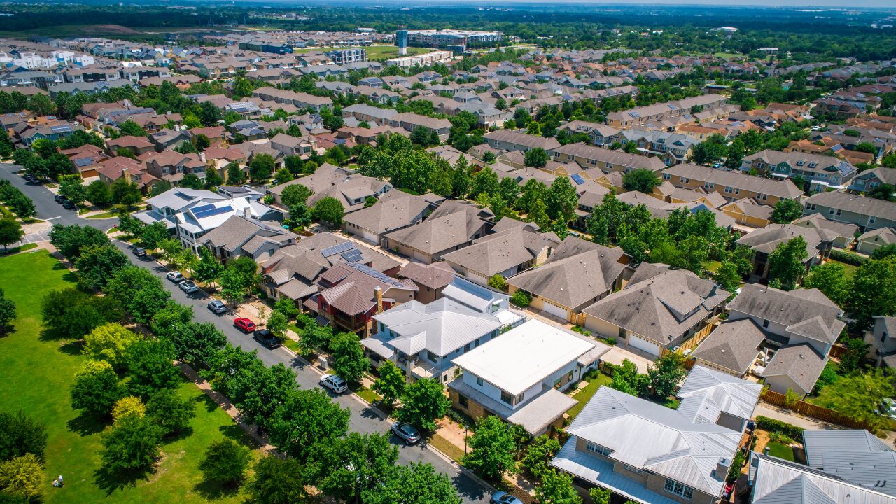 Residential neighborhood showcasing diverse housing options, reflecting the current property market trends for Yellow Brick Road Home Loans.