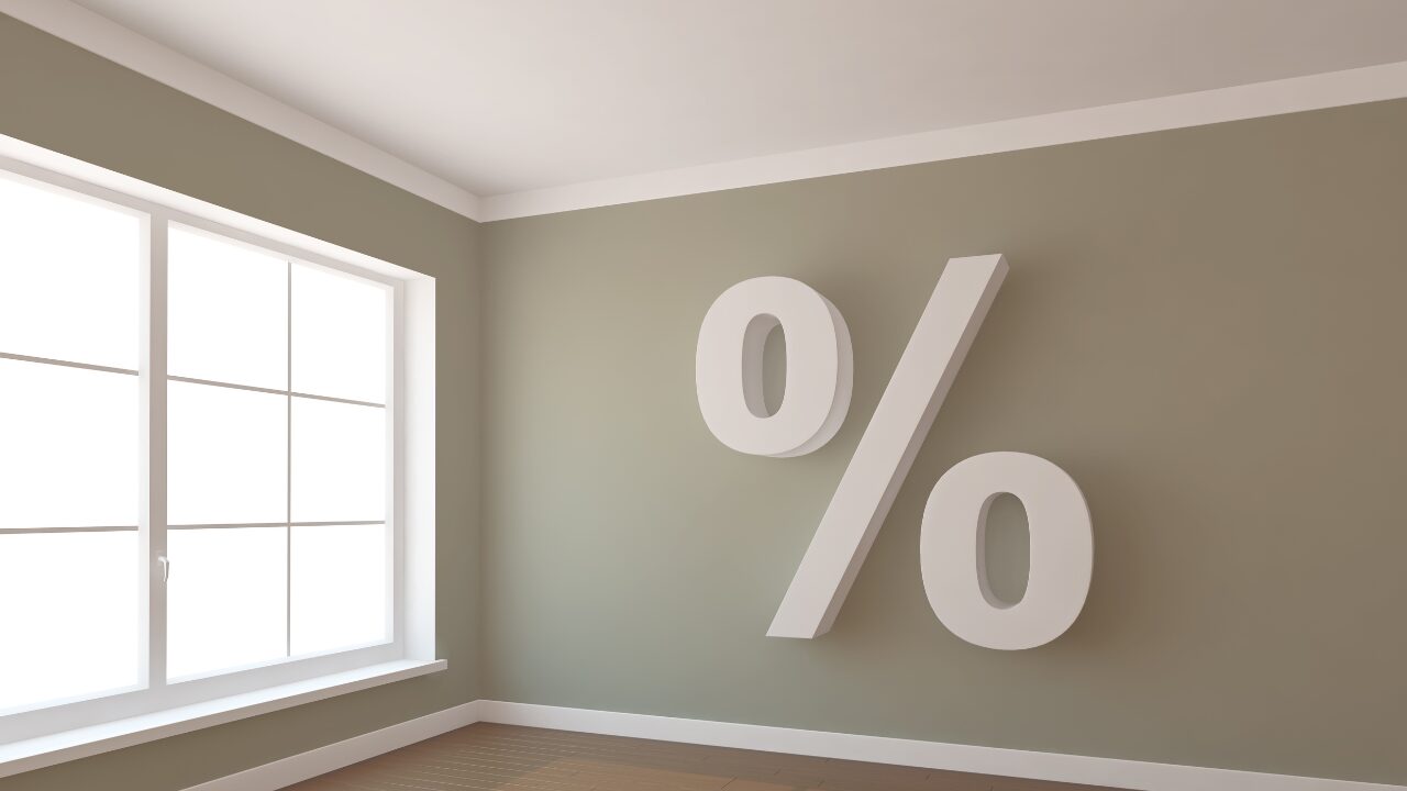 Stylish interior with a large percentage symbol, representing cashback deals on home loans from Yellow Brick Road.